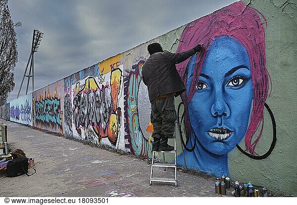 Germany  Berlin  07. 032021  Sunday afternoon in Mauerpark  graffiti wall  graffiti artist Eme Freethinker  Europe