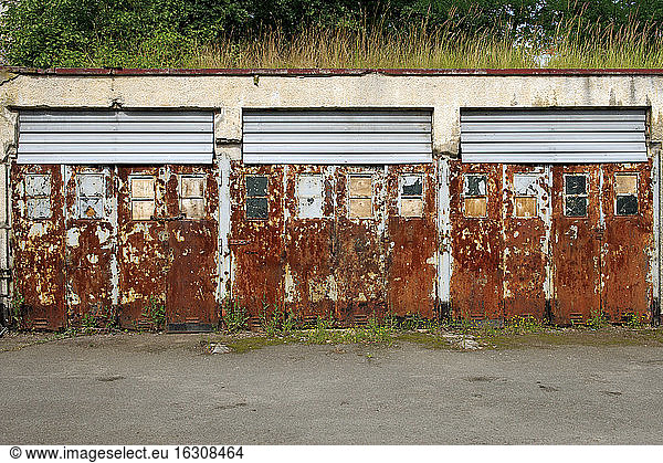 Germany  Brandenburg  Wustermark  Olympic village 1936  view to rusted garage doors