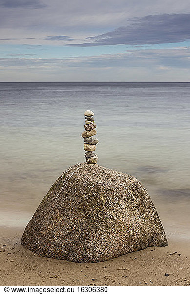 Germany  Brodten  Pile of rocks at beach