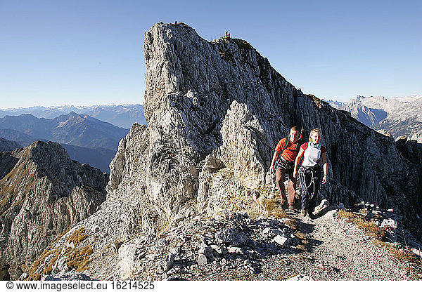 Germany  couple hiking Mittenwald alps