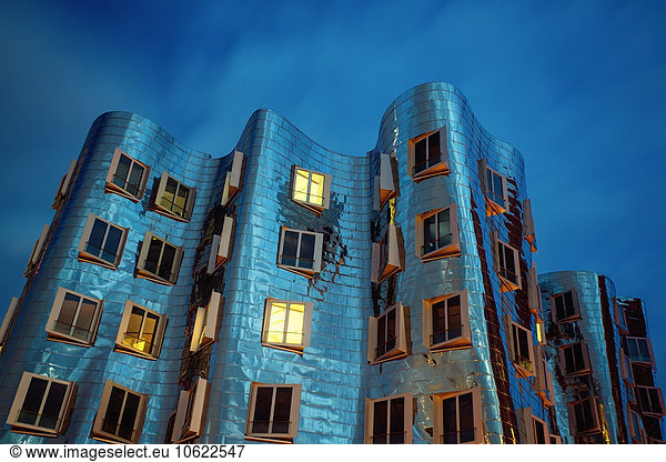 Germany  Duesseldorf  facade of Gehry house at twilight