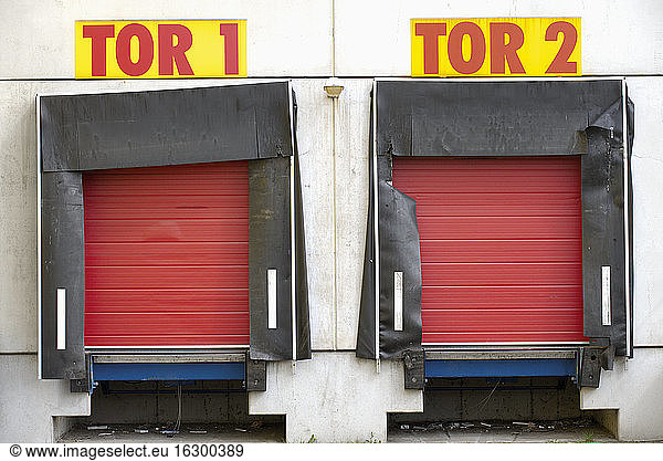 Germany  facade with two red roller shutters