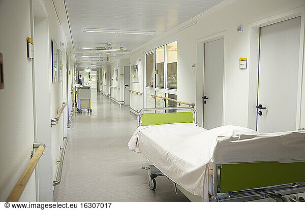 Germany  Freiburg  View of bed in empty hospital corridor