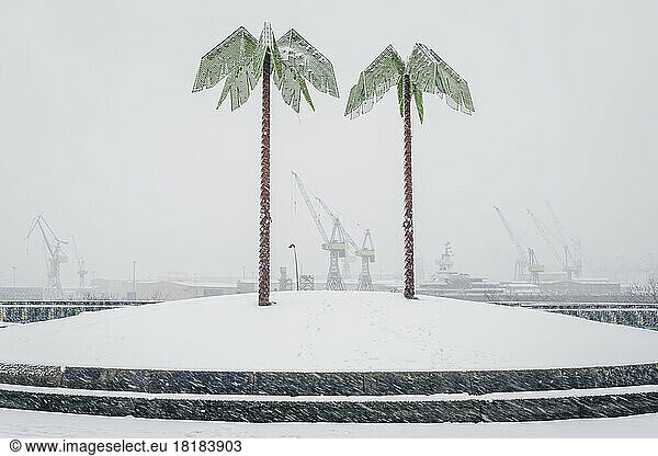 Germany  Hamburg  Artificial palm trees in Park Fiction during snowfall