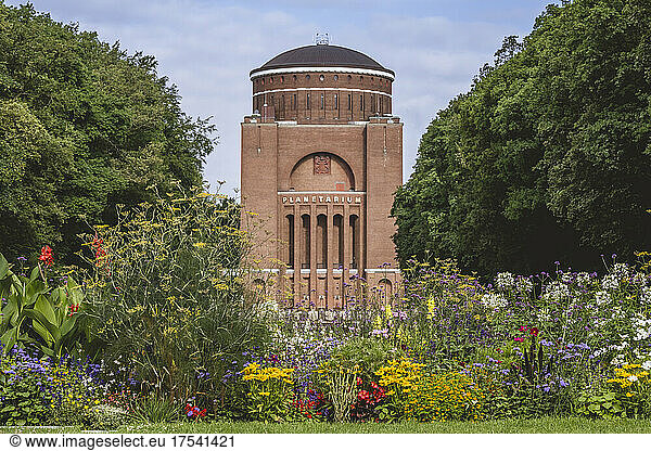 Germany  Hamburg  Colorful flowers blooming in front of Hamburg Planetarium