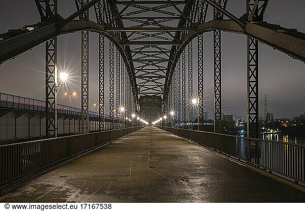 Germany  Hamburg  Diminishing perspective of Alte Harburger Elbbrucke bridge at night