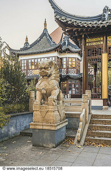 Germany  Hamburg  Guardian statue in front of Yu Garden tea house and restaurant