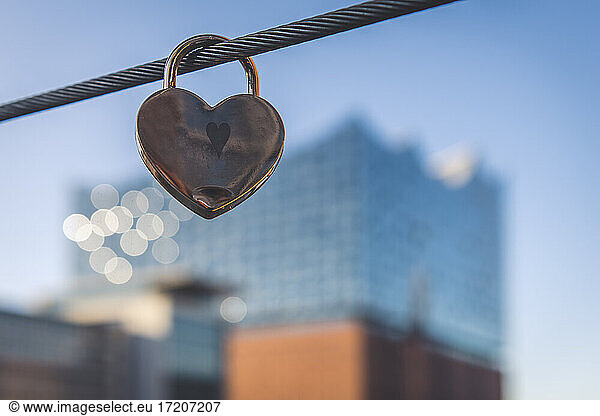 Germany Hamburg Heart shaped padlock against Elbe Philharmonic Hall