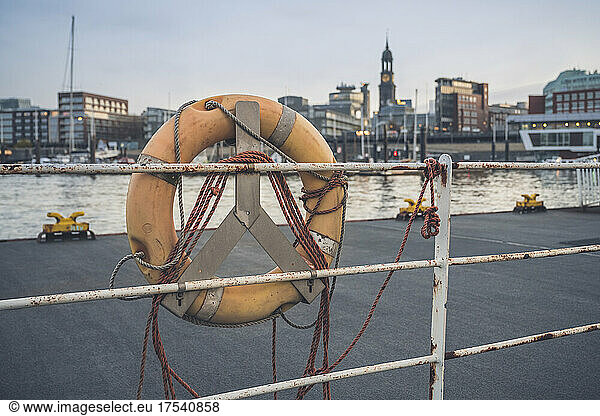 Germany  Hamburg  Life belt hanging on harbor railing