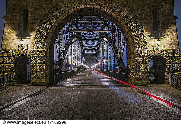 Germany  Hamburg  Light trails stretching across Alte Harburger Elbbrucke bridge at night