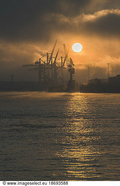 Germany  Hamburg  Port of Hamburg at cloudy sunrise