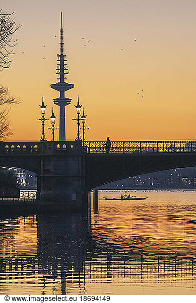 Germany  Hamburg  Schwanenwikbrucke at sunset with Heinrich-Hertz-Tower in background
