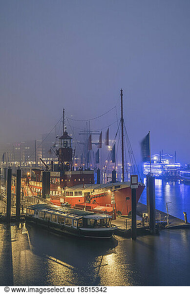 Germany  Hamburg  Ship docked in Port of Hamburg at foggy night