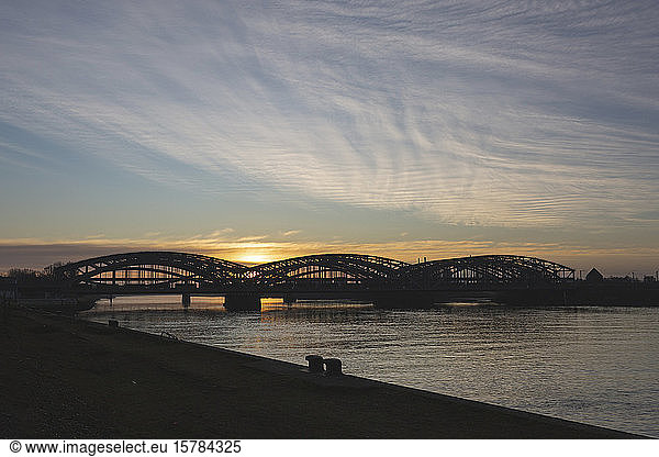 Germany  Hamburg  Silhouette of Elbbrucken bridge at sunrise