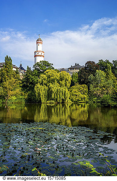 Germany  Hesse  Bad Homburg vor der Hohe  White Tower rising above trees surrounding green lake