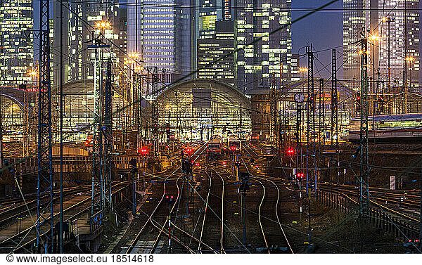 Germany  Hesse  Frankfurt  Tracks in front of train station at night