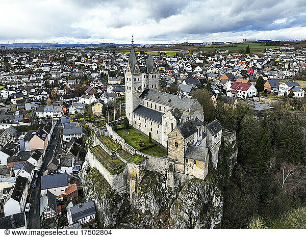 Germany  Hesse  Limburg an der Lahn  Dietkirchen  Helicopter view of Church of Saint Lubentius and surrounding town