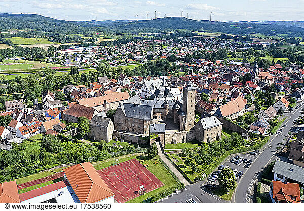 Germany  Hesse  Steinau an der Strasse  Aerial view of Schloss Steinau and surrounding houses in summer