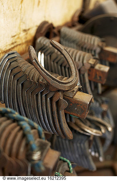 Germany  Horseshoe stacked in workers garage