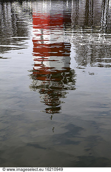 Germany  Lighthouse reflecting in water
