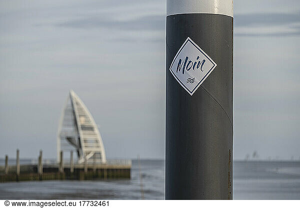 Germany  Lower Saxony  Juist  Greeting sticker on coastal street light