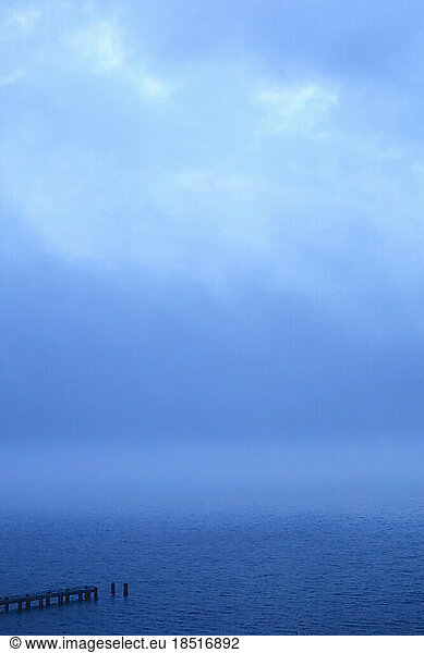 Germany  Mecklenburg-Vorpommern  Baltic Sea during foggy weather with jetty in foreground