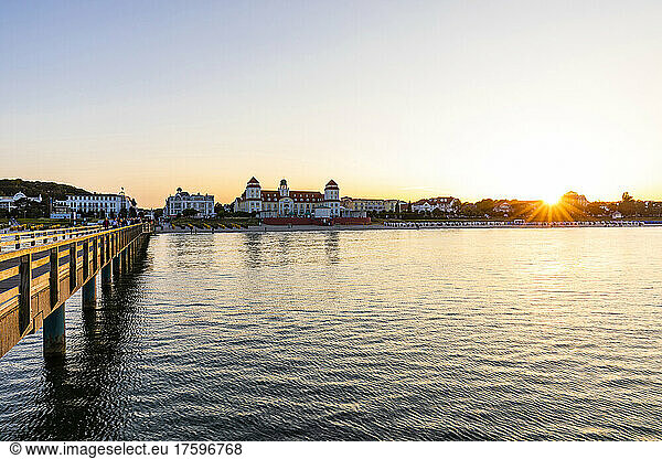 Germany  Mecklenburg-Vorpommern  Binz  Coastline of Rugen island at sunset with Kurhaus Binz in background