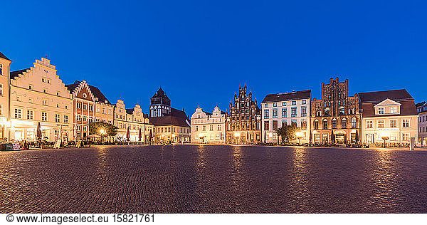 Germany  Mecklenburg-Western Pomerania  Greifswald  Illuminated market square at dusk