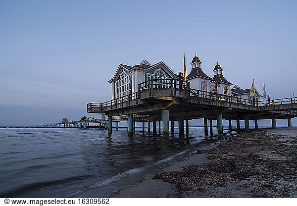 Germany  Mecklenburg-Western Pomerania  Rugia  view to sea bridge at Baltic seaside resort Sellin by twilight