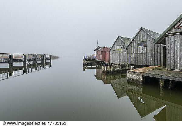Germany  Mecklenburg-Western Pomerania  Zingst  Pier and row of coastal boathouses