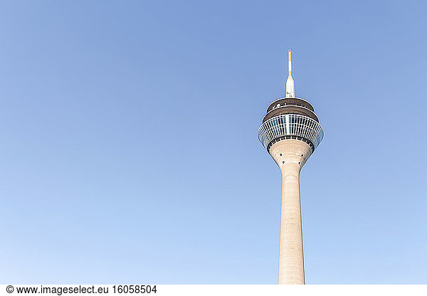 Germany  North Rhine-Westfalia  Dusseldorf  Rhine Tower standing against clear blue sky