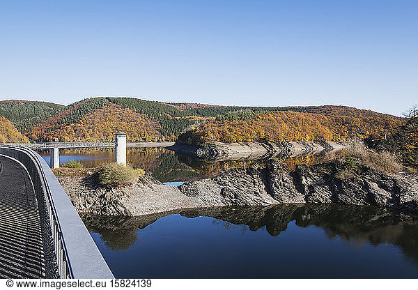Germany  North Rhine-Westphalia  Clear sky over Urft Dam in autumn