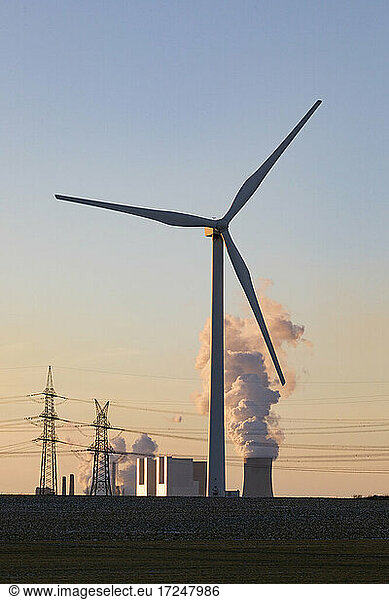 Germany  North Rhine Westphalia  Neurath  Wind turbine with lignite power station in background