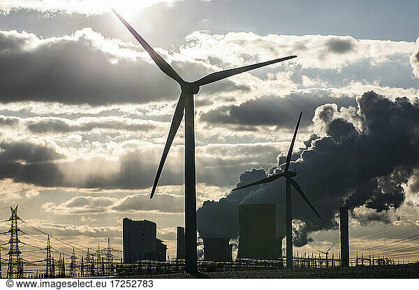 Germany  North Rhine Westphalia  Niederaussem  Wind turbine with lignite power plant in background