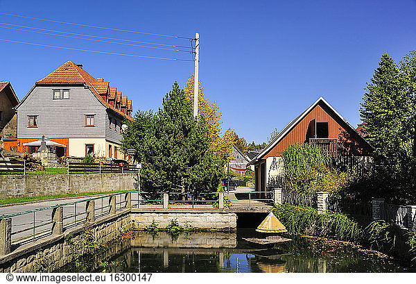 Germany  Saxony  Hinterhermsdorf  Houses at a pond