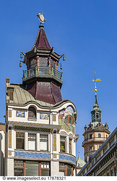 Germany  Saxony  Leipzig  Exterior of cafe Riquet with bell tower of Saint Nicholas Church in background