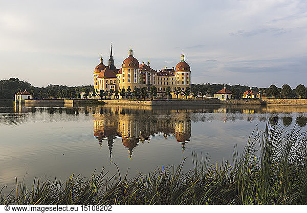 Germany  Saxony  Moritzburg Castle at castle pond in the evening