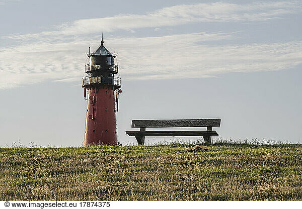Germany  Schleswig-Holstein  Pellworm  Empty bench in front of Pellworm Lighthouse