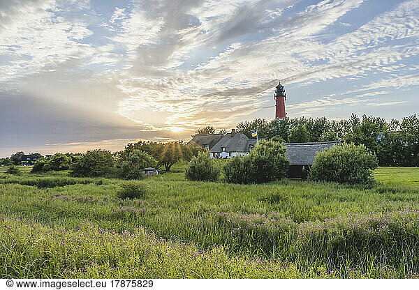 Germany  Schleswig-Holstein  Pellworm  Pellworm Lighthouse and surrounding landscape at springtime sunset