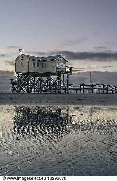 Germany  Schleswig-Holstein  St. Peter-Ording  Coastal stilt house at dawn