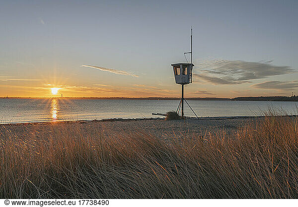 Germany  Schleswig-Holstein  Strande  Coastal lookout tower at sunset