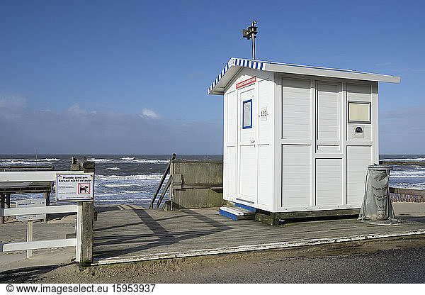 Germany  Schleswig-Holstein  Westerland  White painted seaside hut for beach chair rental