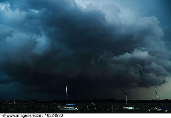 Germany  Stegen at Ammersee  sailing boats at thunderstorm