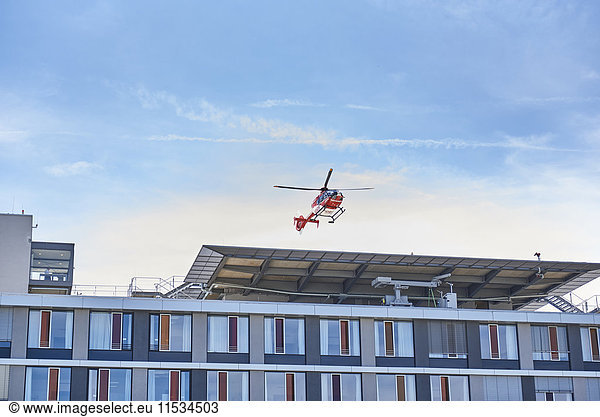 Germany  Ulm  rescue helicopter landing on roof top of university hospital