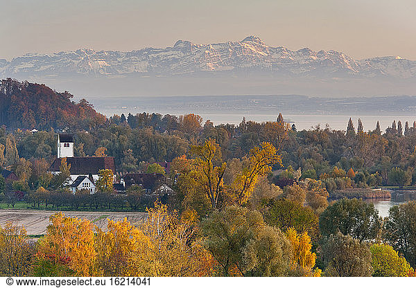 Germany  View of village and swiss alps in background