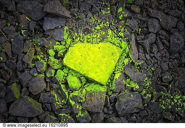Germany  Yellow sprayed graffiti on basalt stone