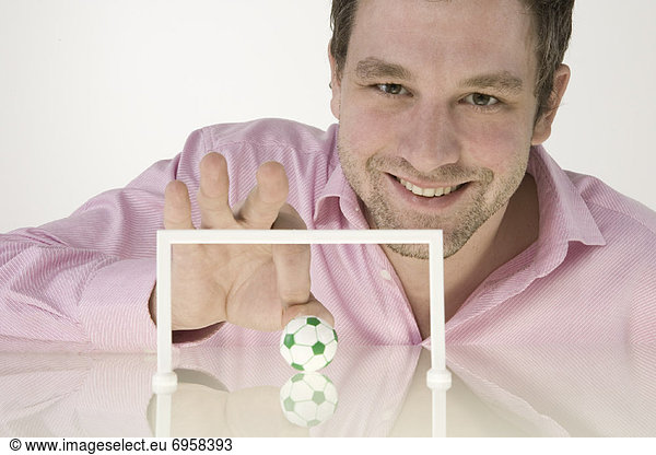 Geschäftsmann Modell Football Miniatur spielen