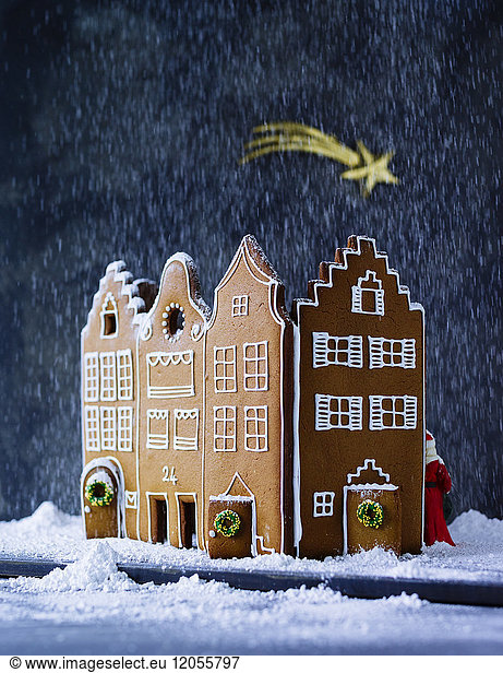 Gingerbread house in artificial snow