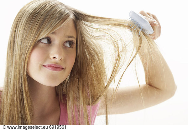 Girl Brushing Hair