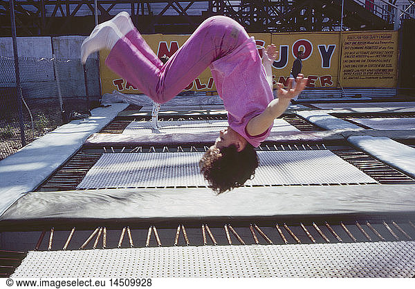 Girl Flipping on Amusement Park Trampoline  Coney Island  New York  USA  August 1961